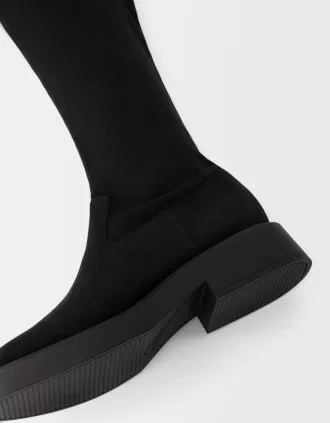Botas planas hasta la rodilla