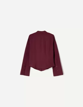 Camisa ajustada con mangas acampanadas