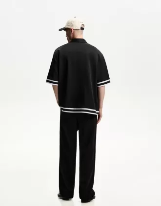 Camisa boxy fit manga corta bordada