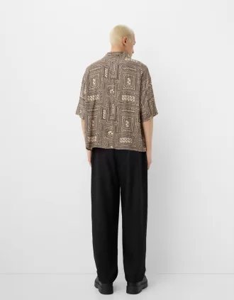 Camisa boxy fit manga corta estampada