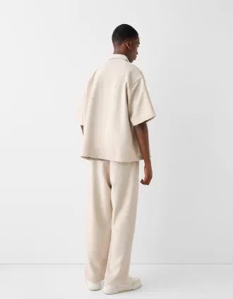 Camisa entallada de manga corta con corte boxy