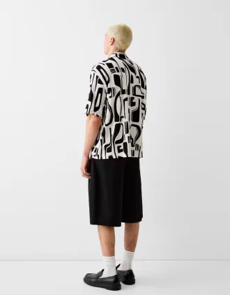 Camisa plisada manga corta estampada
