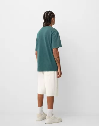 Camiseta efecto desgastado de manga corta con estampado