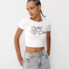 Camiseta espalda abierta con pedrería