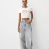 Camiseta espalda abierta con pedrería