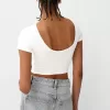 Camiseta espalda abierta con pedrería
