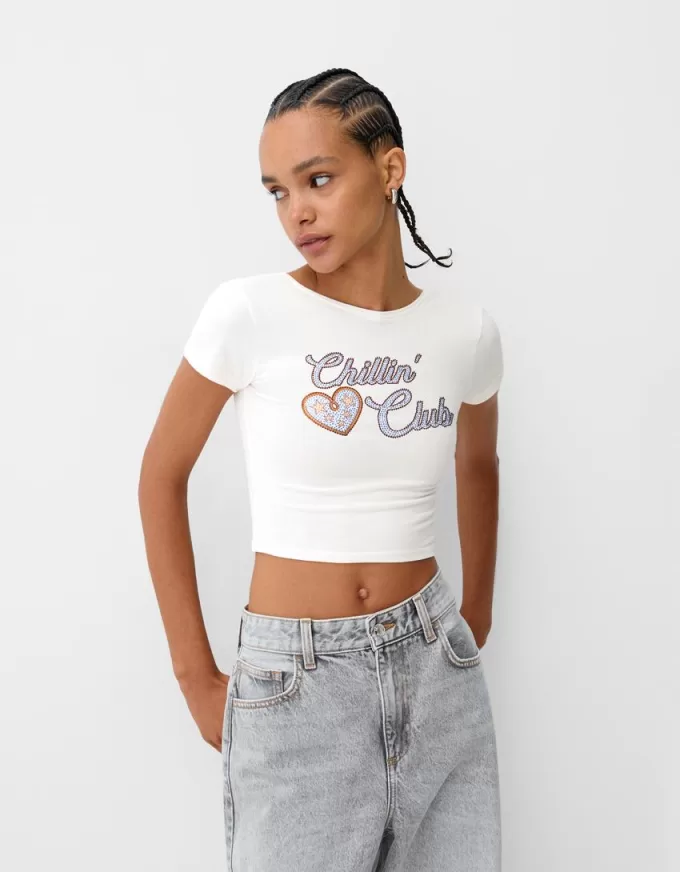 Camiseta espalda abierta con pedrería