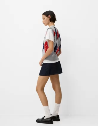 Chaleco con cuello en V y estampado de rombos