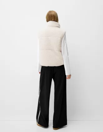 Chaleco reversible de borreguito sintético