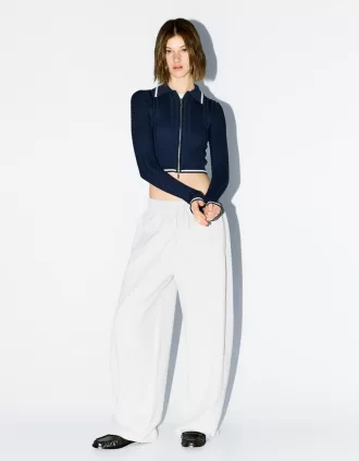 Chaqueta con cremallera y cuello polo de punto trenzado