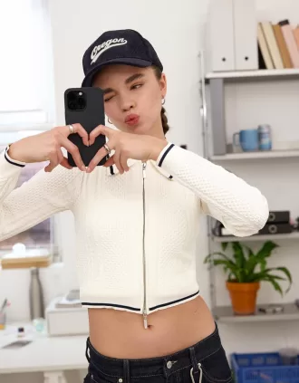Chaqueta con cremallera y cuello polo de punto trenzado