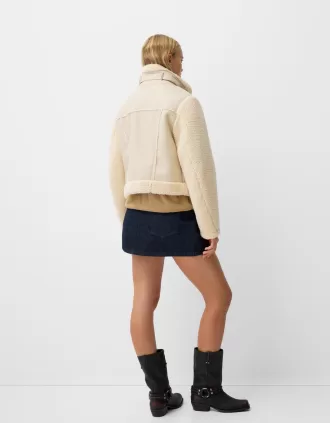 Chaqueta de doble faz con mangas de borreguito sintético