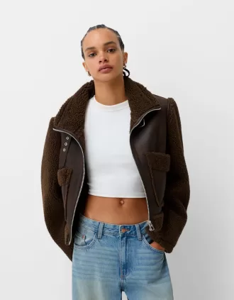Chaqueta de doble faz con mangas de borreguito sintético