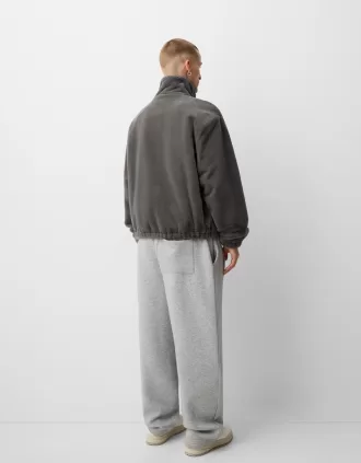 Chaqueta pelo sintético cuello alto con cremallera