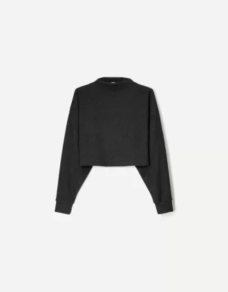 Jersey canalé cuello alto tacto suave