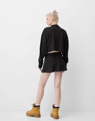 Jersey canalé cuello alto tacto suave