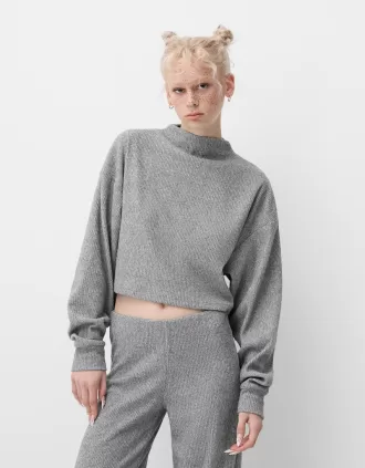 Jersey canalé cuello alto tacto suave