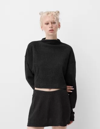 Jersey canalé cuello alto tacto suave