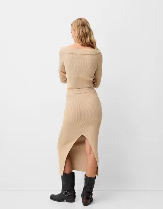 Jersey con cuello en V y hombros descubiertos
