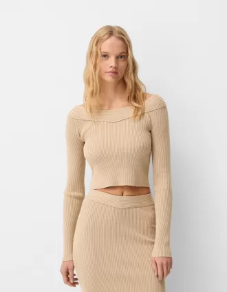 Jersey con cuello en V y hombros descubiertos