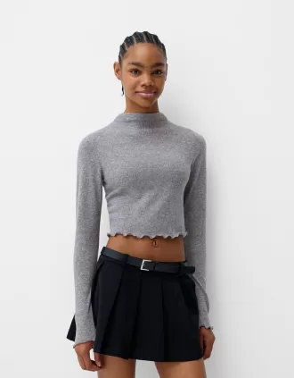 Jersey cropped de tacto suave con cuello alto