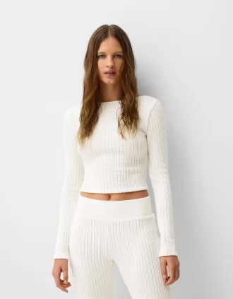Jersey de punto trenzado de manga larga con espalda abierta