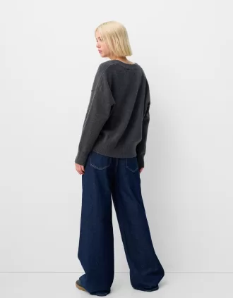 Jersey oversize con cuello de pico
