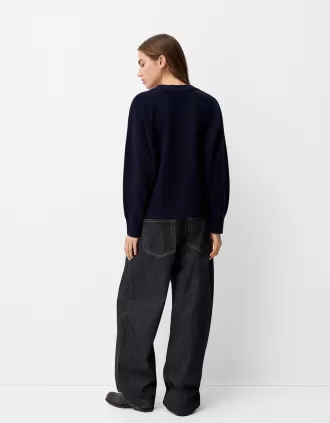 Jersey oversize con cuello de pico