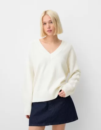 Jersey oversize con cuello de pico