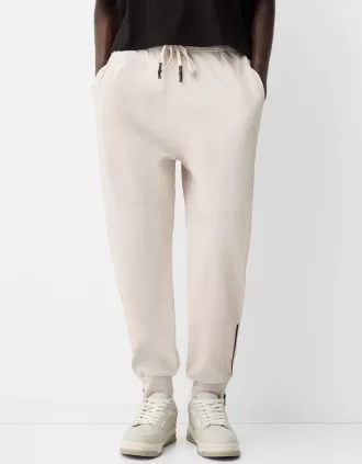 Joggers con cremalleras