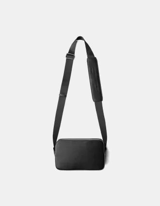 Minaudière bandolera rígida