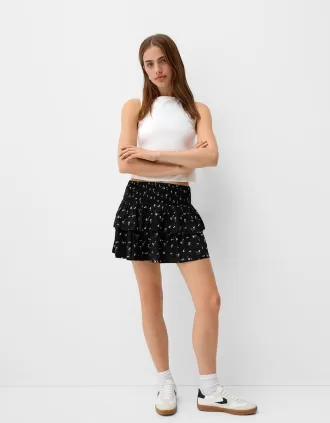 Minifalda con volantes y cintura elástica