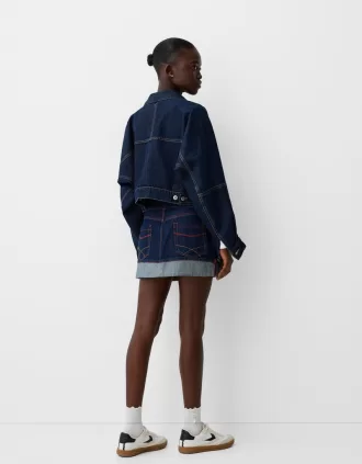 Minifalda denim con vuelta