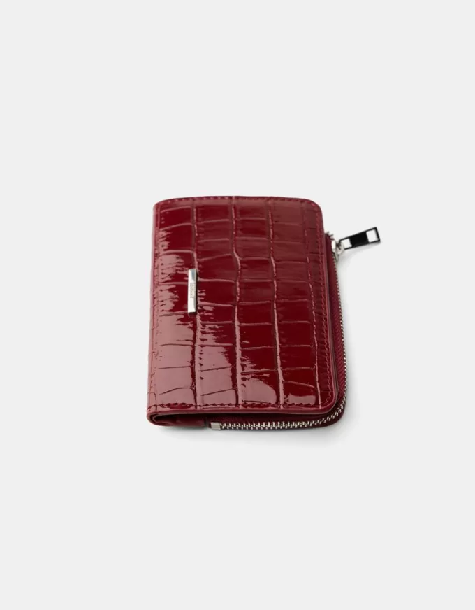 Monedero con estampado animal efecto charol grabado