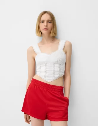 Pantalón corto retro con raya lateral