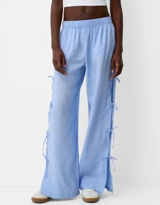 Pantalón fluido con lazos laterales