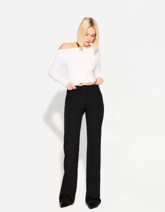 Pantalones boot-cut de talle bajo