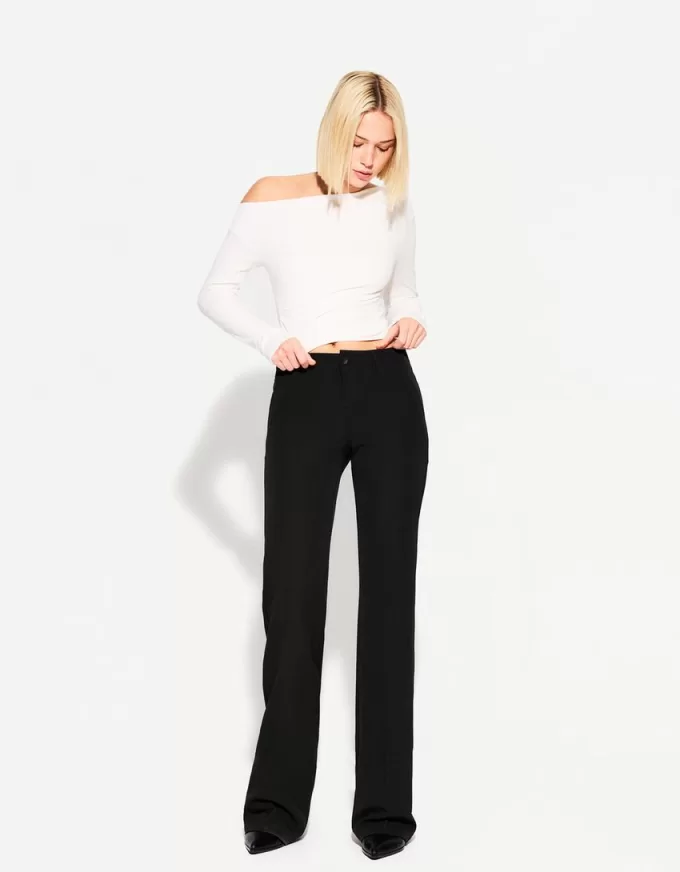 Pantalones boot-cut de talle bajo