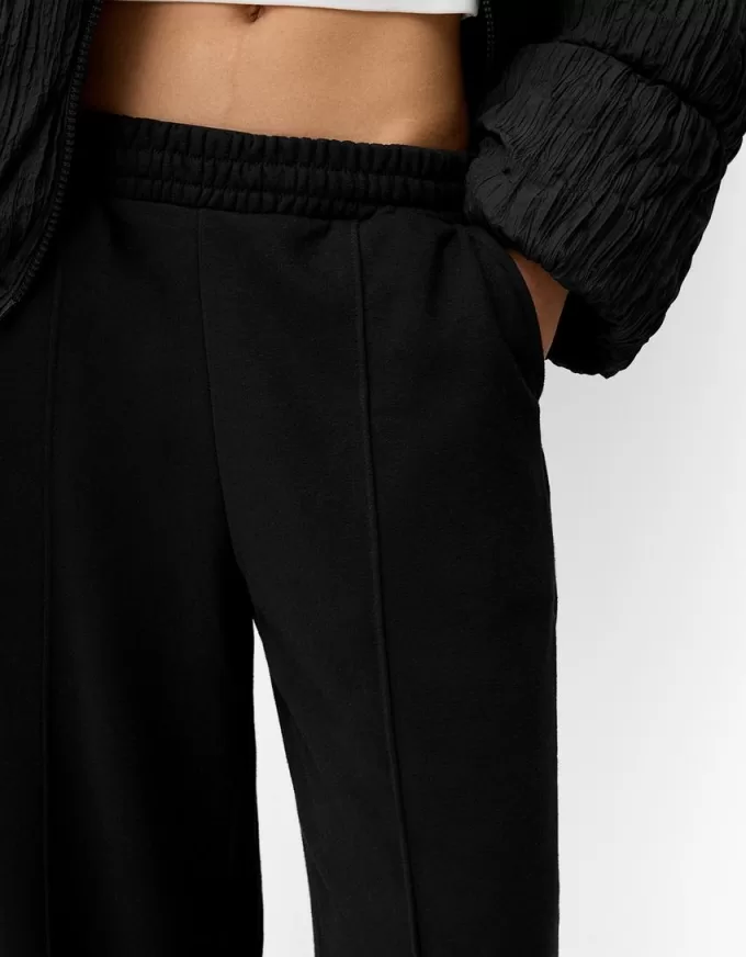 Pantalones deportivos de pierna ancha
