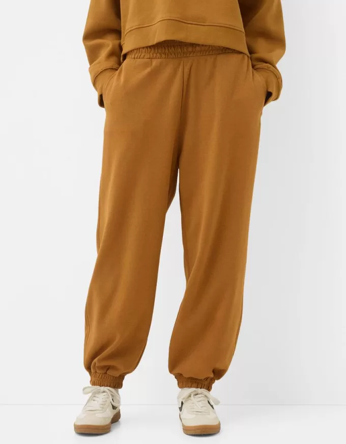 Pantalones jogger voluminosos interlock