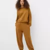 Pantalones jogger voluminosos interlock