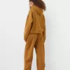 Pantalones jogger voluminosos interlock