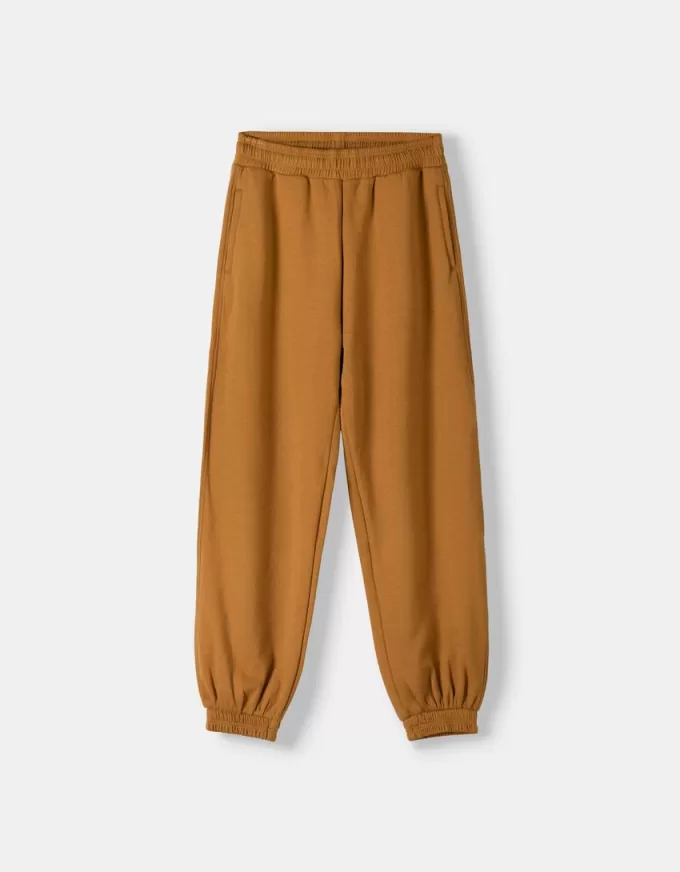 Pantalones jogger voluminosos interlock