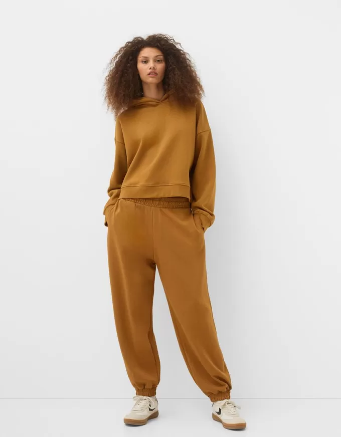 Pantalones jogger voluminosos interlock