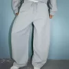 Pantalones tipo sudadera de material tipo barril