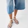 Sandalias planas con detalle de anilla.