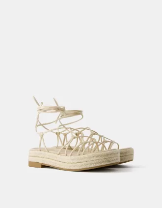 Sandalias planas de yute atadas