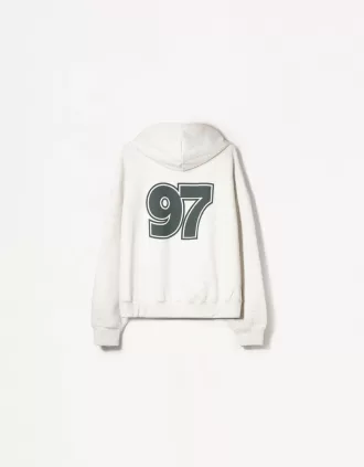 Sudadera con capucha estampada y cremallera