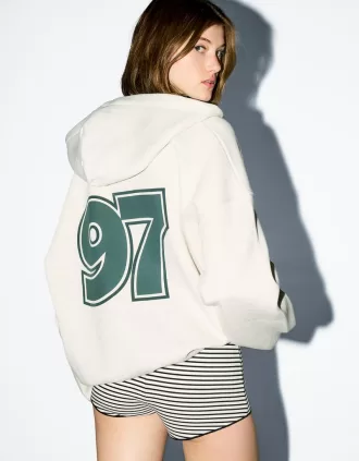 Sudadera con capucha estampada y cremallera