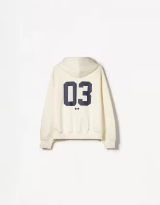Sudadera con capucha estampada y cremallera